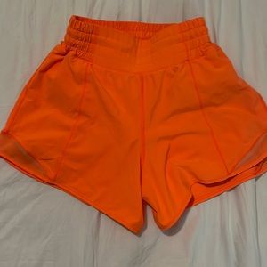 Size 2 Lululemon 4in hotty hort highlighter orange shorts
